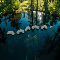 Scale Model of Nessie Glow in the Dark by Model Scenery World daytime on the pond